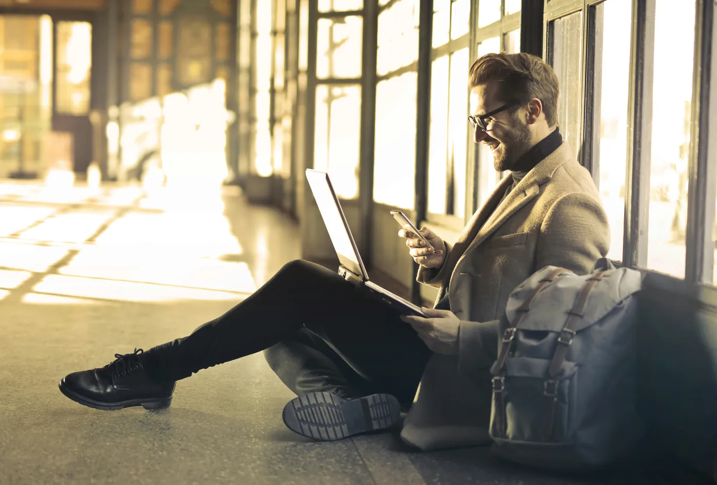 A corporate traveller working before a flight
